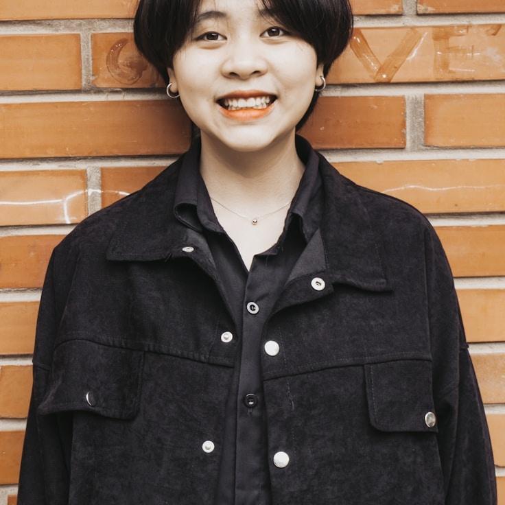 Kaveri Mehta, Lead Design Curator at Lenss Park Island, reviewing corporate floral arrangements